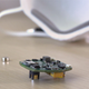 “FaceBit outside of a mask, next to its small battery.”
